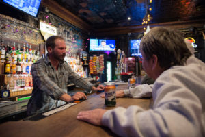 Bartender Ryan Wolfe talks to patrons at The Mine Tavern in Nelsonville on November 18th, 2016